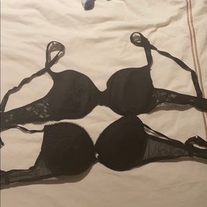 Two black lace bras